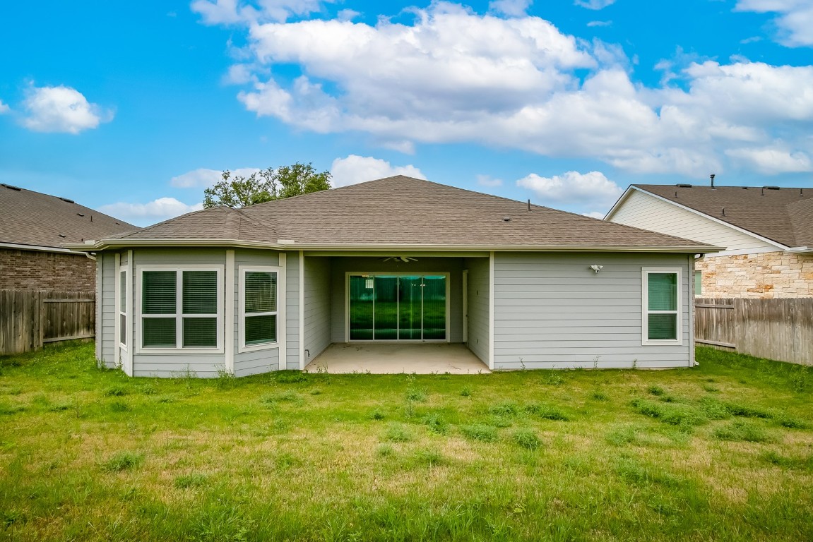 128 Ridgeview Court Georgetown, TX 78628 - Photo 18 of 22 a front view of a house with a garden