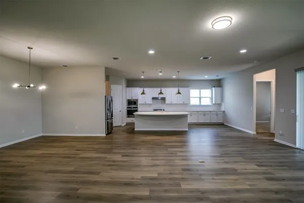 a view of kitchen and kitchen with sink
