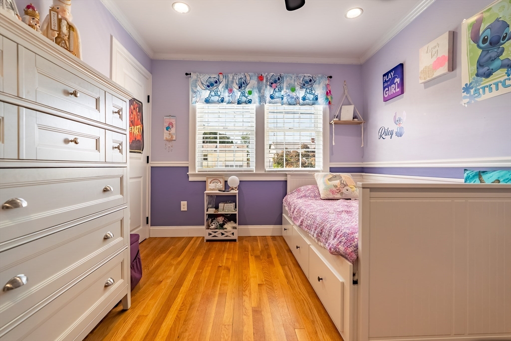 24 Coury Drive Acushnet, MA 02743 - Photo 24 of 42 a spacious bedroom with a bed and a window