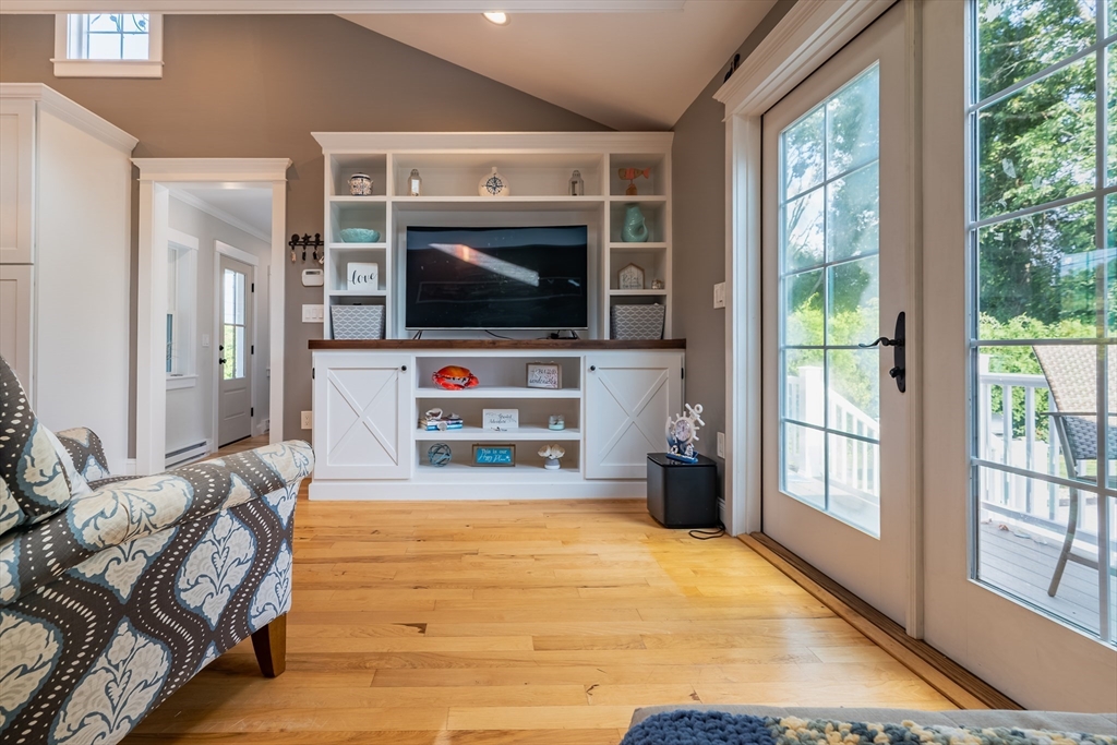24 Coury Drive Acushnet, MA 02743 - Photo 8 of 42 a living room with furniture and a flat screen tv
