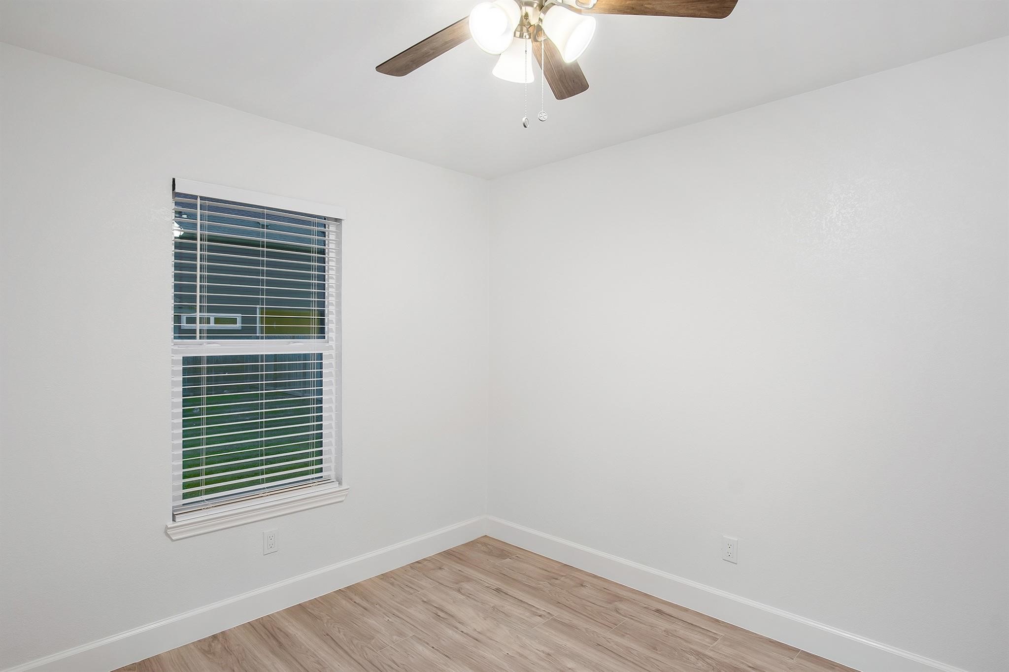 4808 Terry Street Houston, TX 77009 - Photo 16 of 21 an empty room with a window