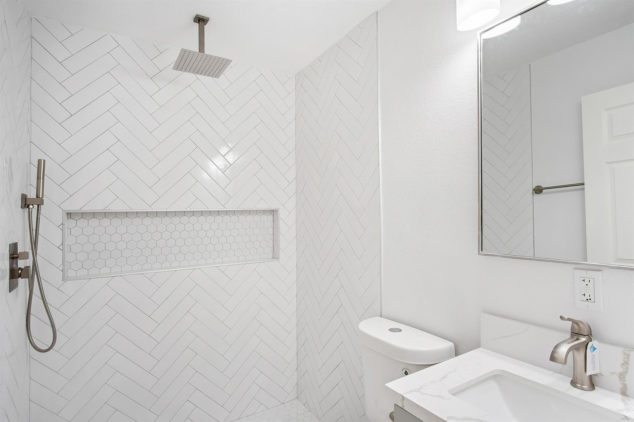 4808 Terry Street Houston, TX 77009 - Photo 18 of 21 a bathroom with a sink and a shower