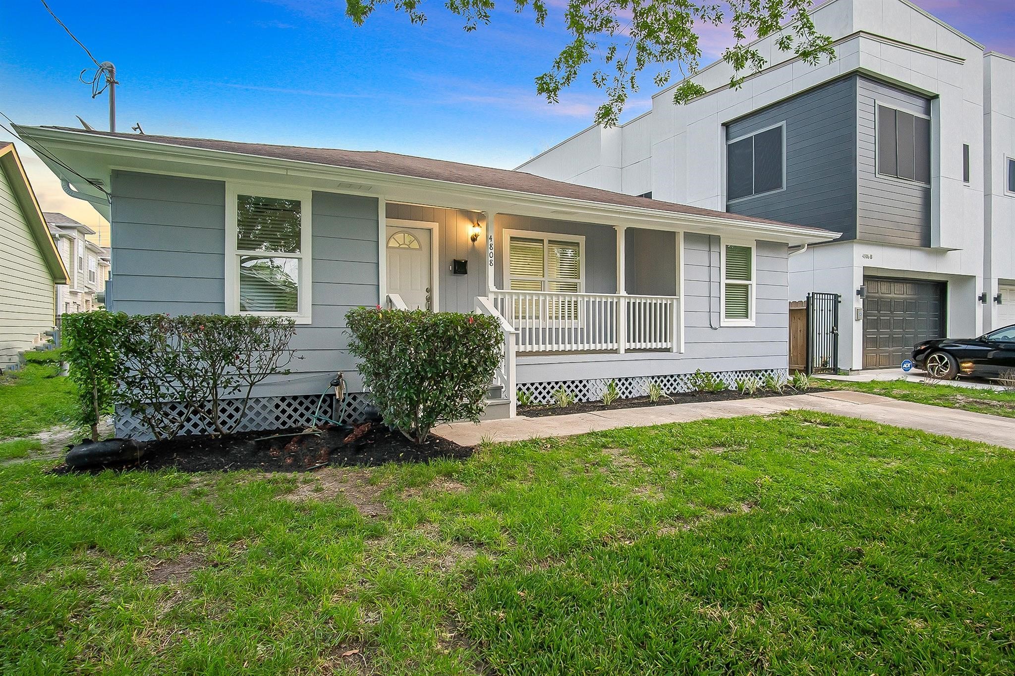 4808 Terry Street Houston, TX 77009 - Photo 2 of 21 front view of a house with a yard