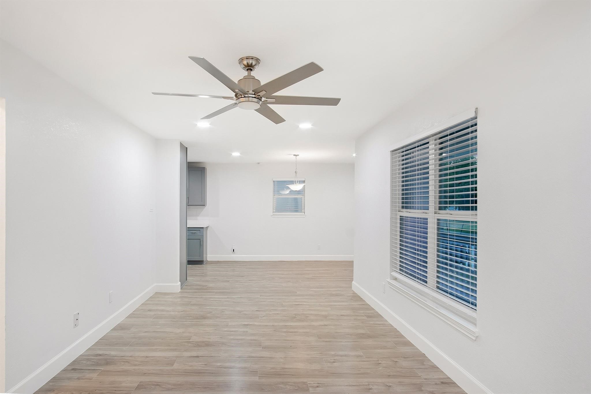 4808 Terry Street Houston, TX 77009 - Photo 6 of 21 a view of an empty room with a window
