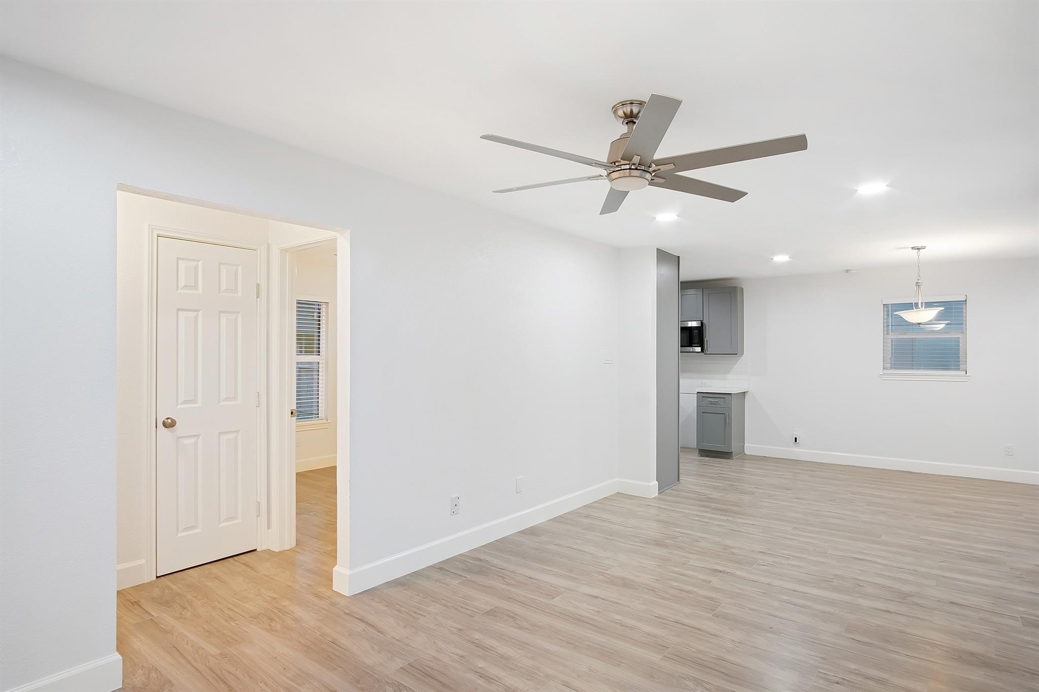 4808 Terry Street Houston, TX 77009 - Photo 7 of 21 a view of a kitchen with a sink and a refrigerator