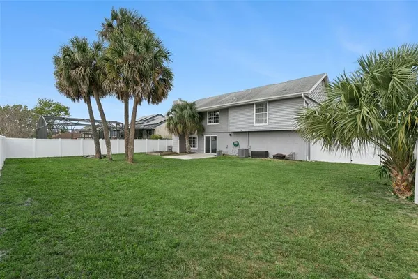 a garden with palm trees