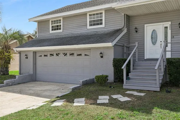 a view of a livingroom with furniture and wooden floor