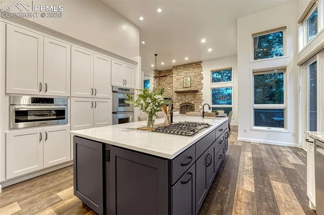 a bathroom with a double vanity sink mirror and