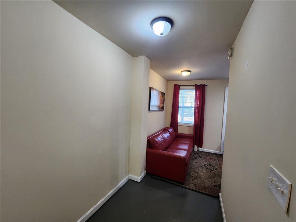 1470 St Michael Avenue, Unit 2 Atlanta, GA 30344 - Photo 15 of 23 a room with furniture and window