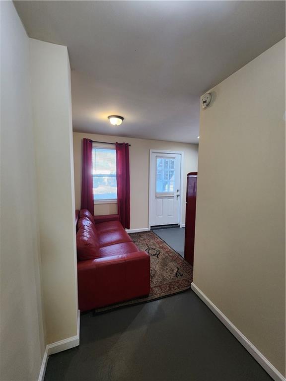 1470 St Michael Avenue, Unit 2 Atlanta, GA 30344 - Photo 5 of 23 a bedroom with a bed and a window