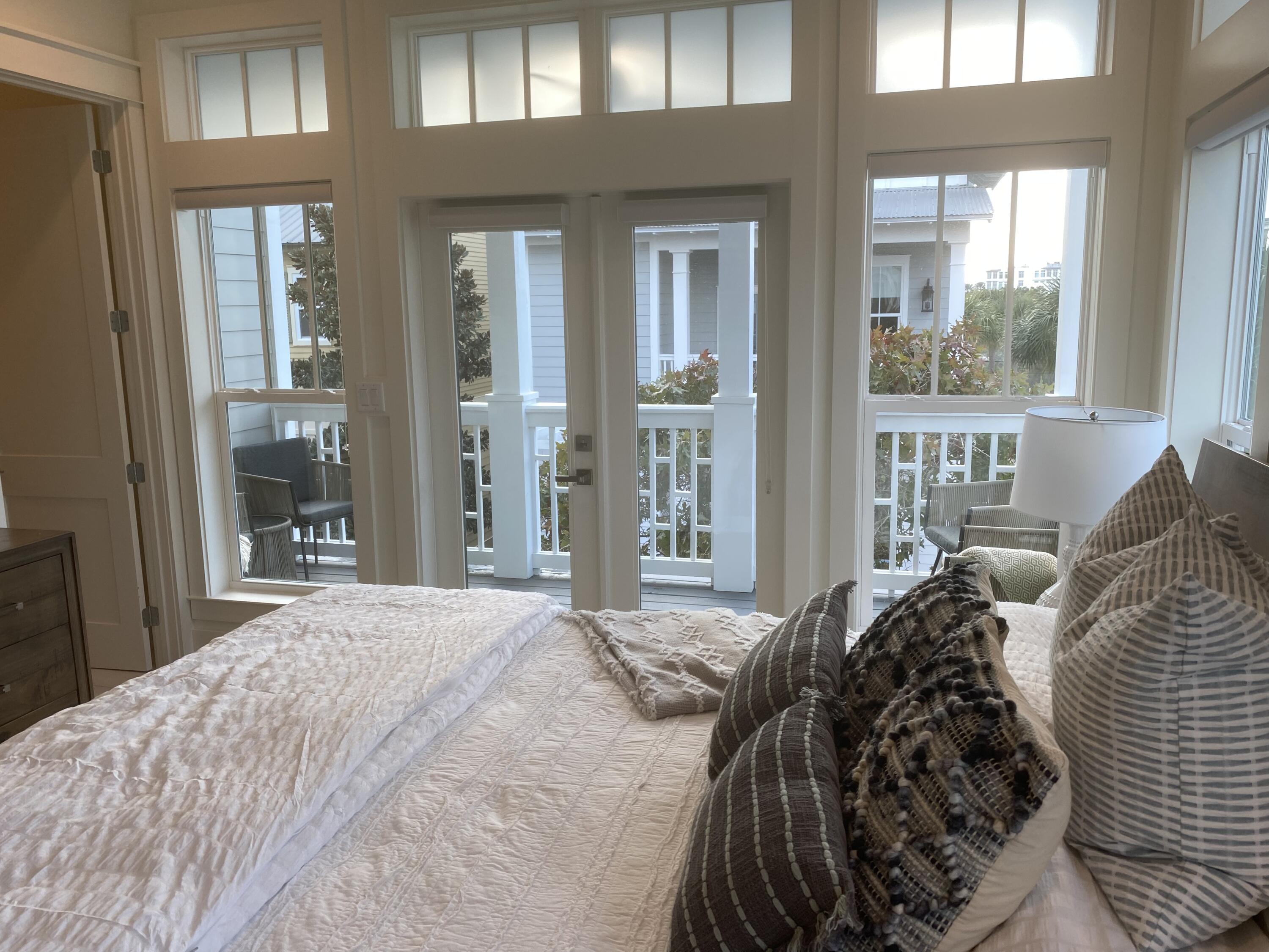 8 Lazy Day Ln Inlet Beach Inlet Beach, FL 32461 - Photo 12 of 13 a bed sitting in a bedroom next to a window