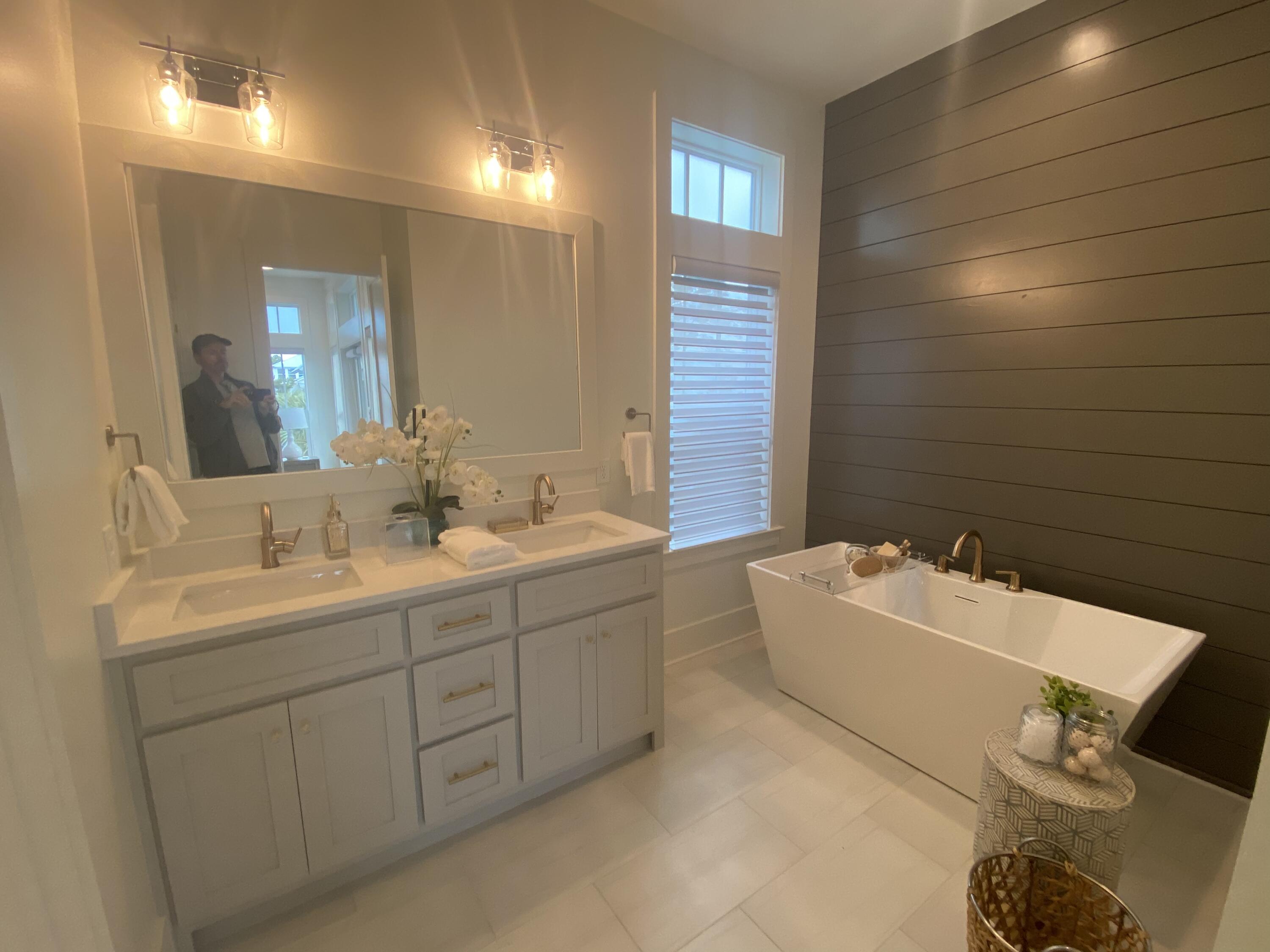 8 Lazy Day Ln Inlet Beach Inlet Beach, FL 32461 - Photo 13 of 13 a bathroom with a sink and a mirror