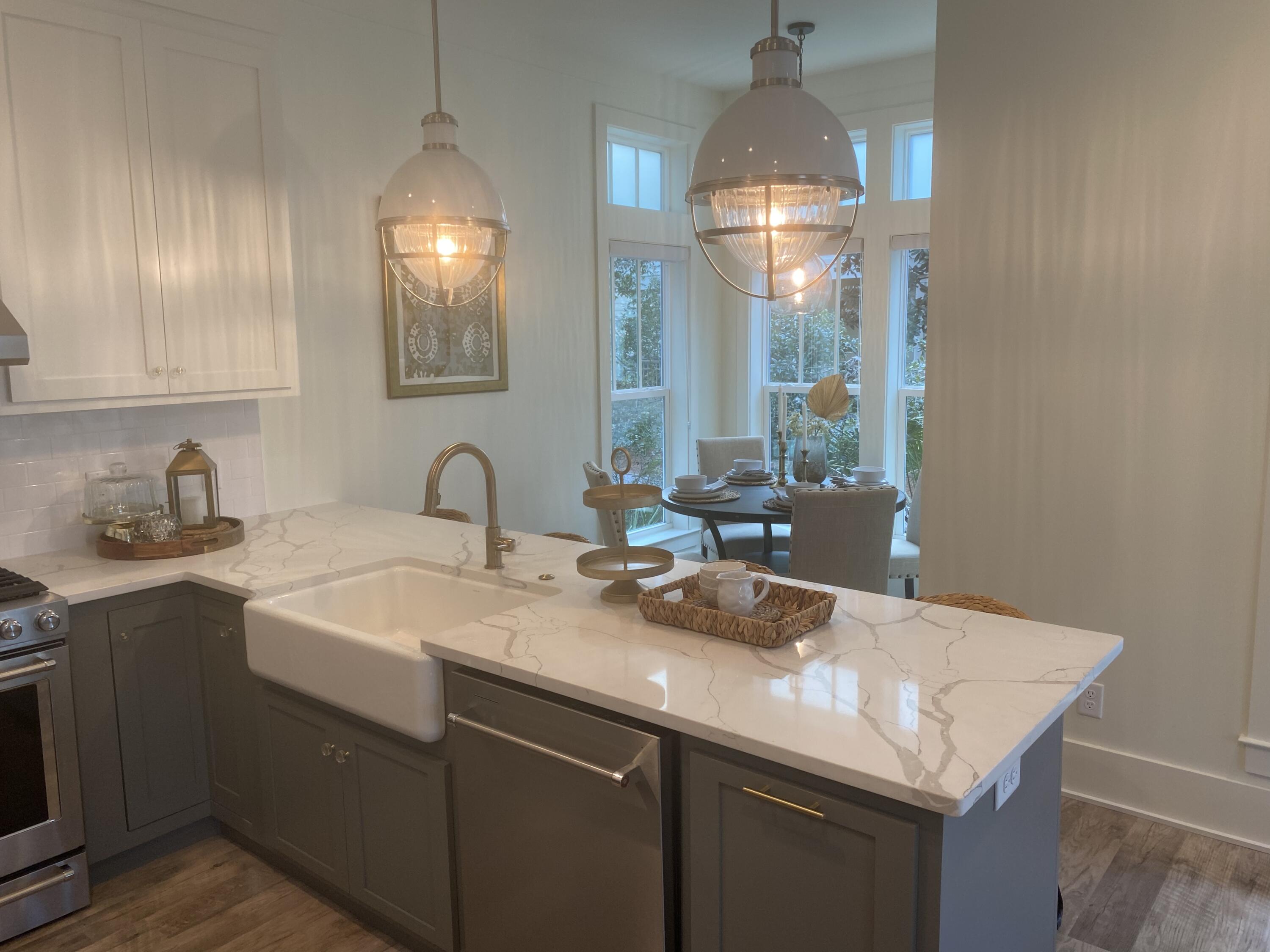 8 Lazy Day Ln Inlet Beach Inlet Beach, FL 32461 - Photo 4 of 13 a kitchen with a sink and cabinets