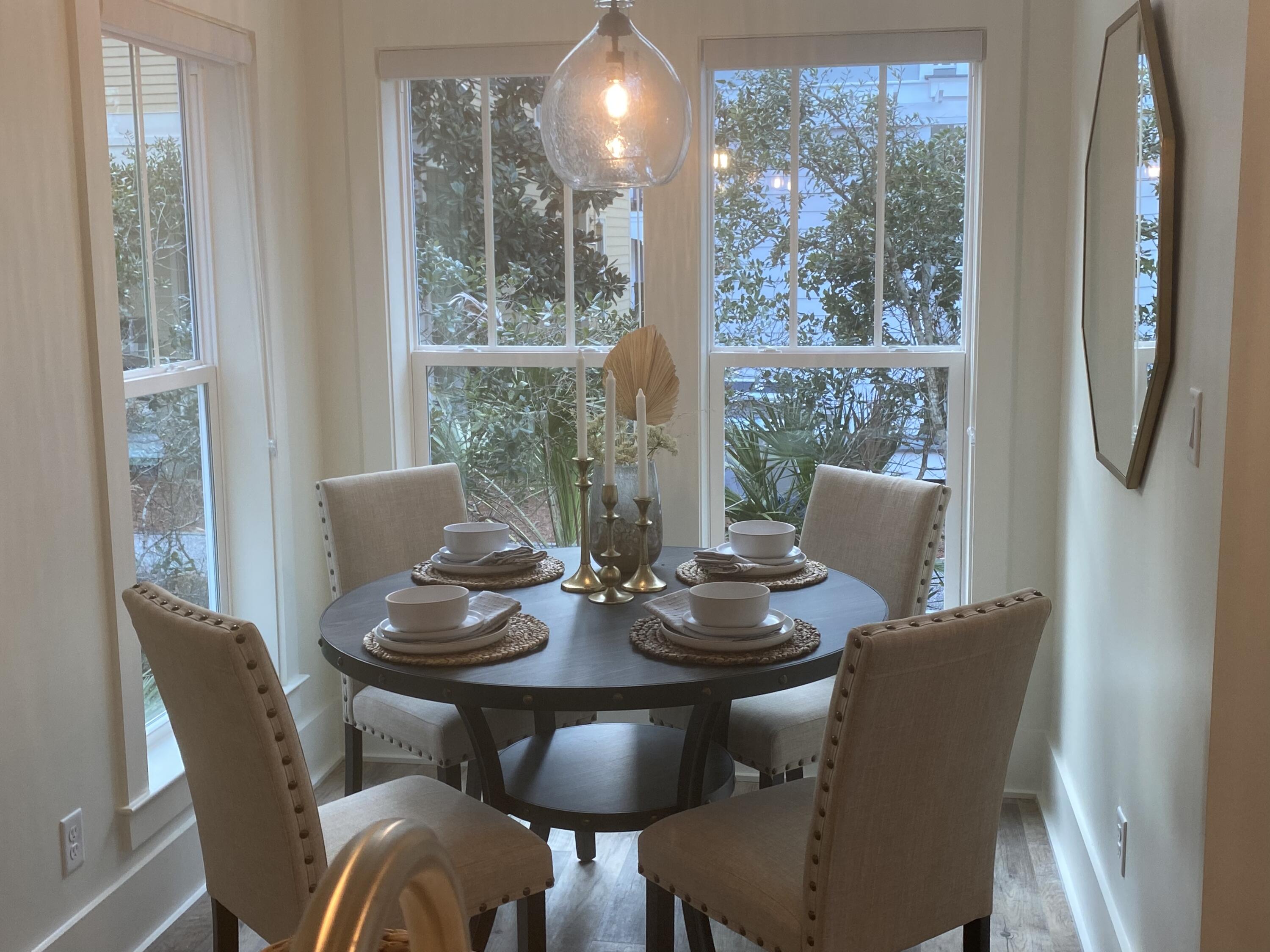 8 Lazy Day Ln Inlet Beach Inlet Beach, FL 32461 - Photo 5 of 13 a view of a dining room with furniture window and outside view