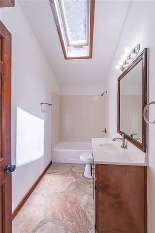 a view of balcony with wooden floor