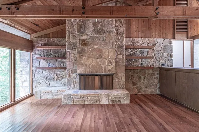 a view of kitchen with furniture and wooden floor