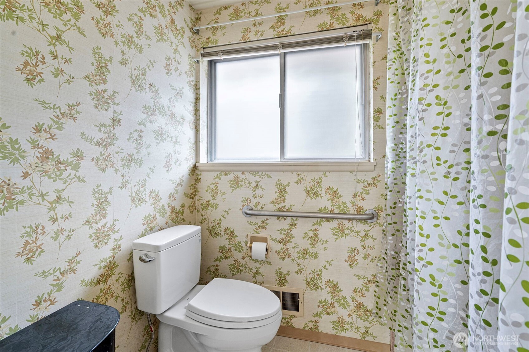 906 Forrest Park Drive Fircrest, WA 98466 - Photo 20 of 37 a white toilet sitting next to a shower curtain