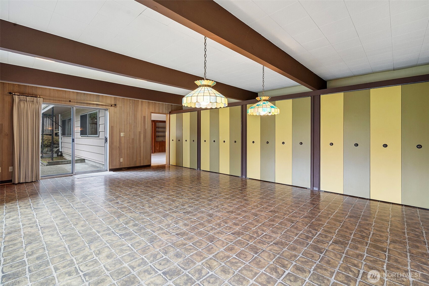 906 Forrest Park Drive Fircrest, WA 98466 - Photo 22 of 37 a view of a hallway with wooden shelves