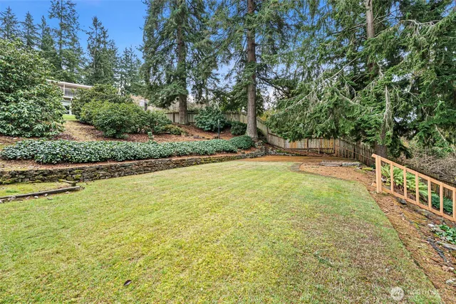 a view of a yard with an outdoor space