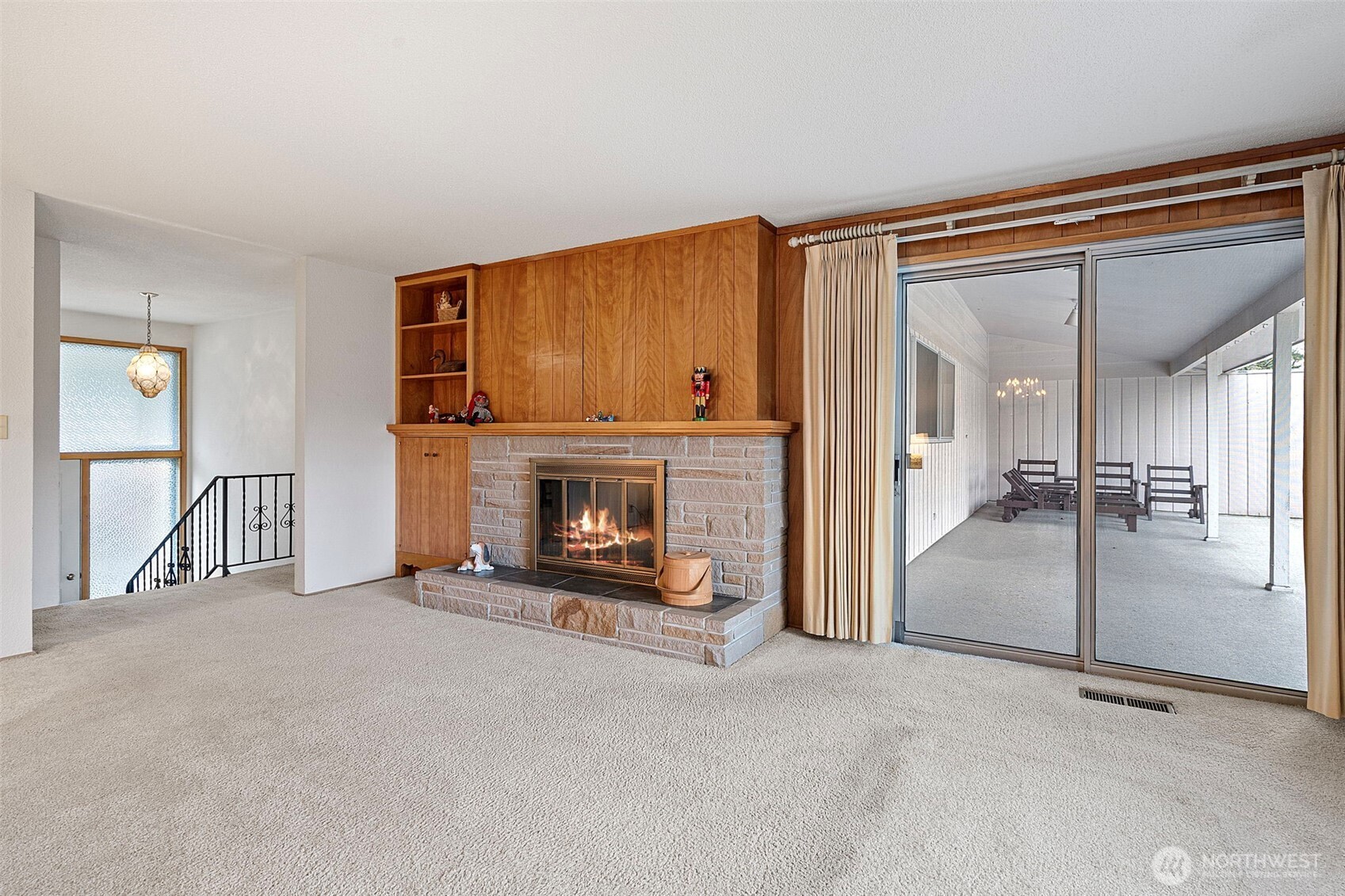 906 Forrest Park Drive Fircrest, WA 98466 - Photo 10 of 37 a view of a livingroom with an empty space and a fireplace