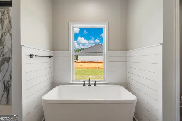 a bathroom with a bathtub