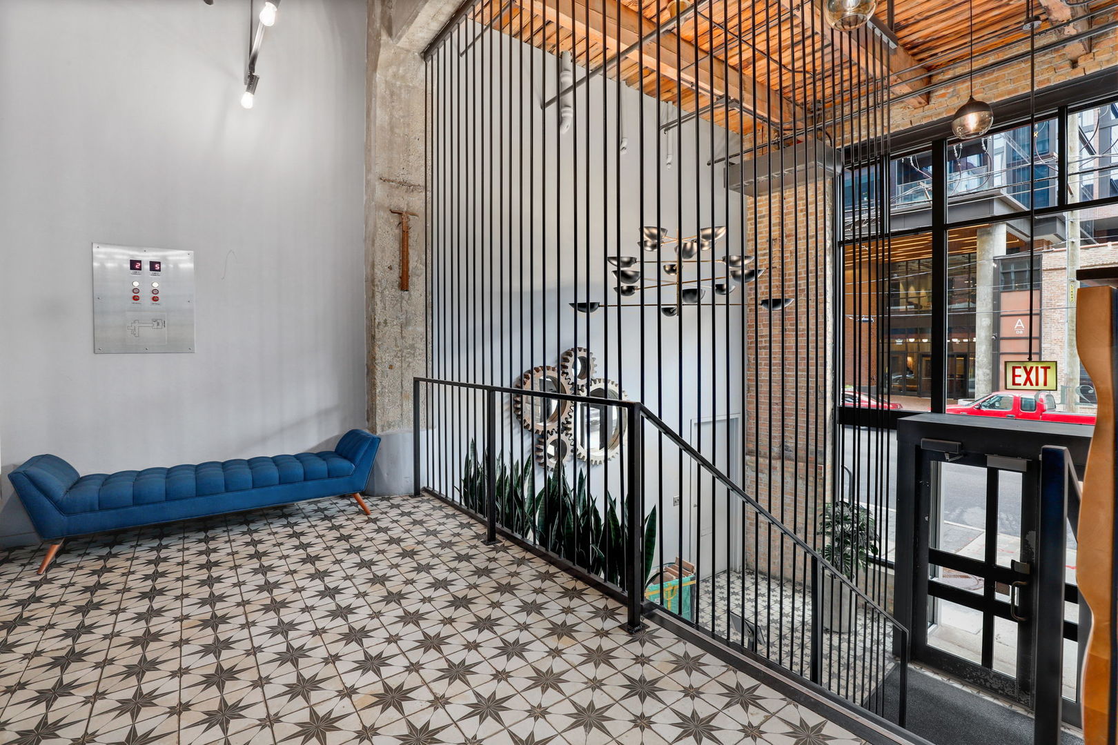 215 North Aberdeen Street, Unit 202B Chicago, IL 60607 - Photo 2 of 19 a bedroom with a bed and wall painting