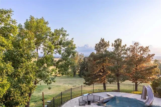 a view of a yard with trees