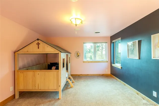 a view of a livingroom with a staircase