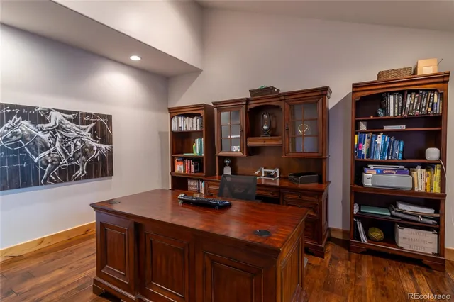 a view of a workspace with furniture
