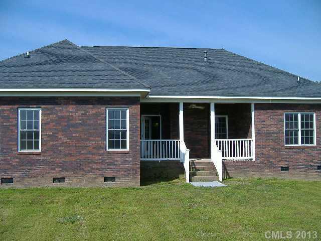 3827 Watson Church Road Monroe, NC 28110 - Photo 14 of 16 a house view with a garden space