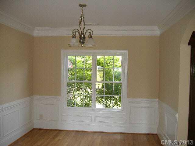 3827 Watson Church Road Monroe, NC 28110 - Photo 5 of 16 a view of a room with a window and chandelier