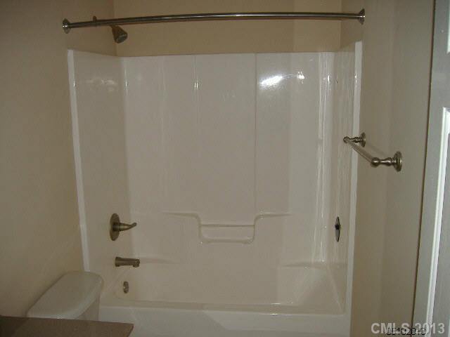 3827 Watson Church Road Monroe, NC 28110 - Photo 6 of 16 a bathroom with a shower