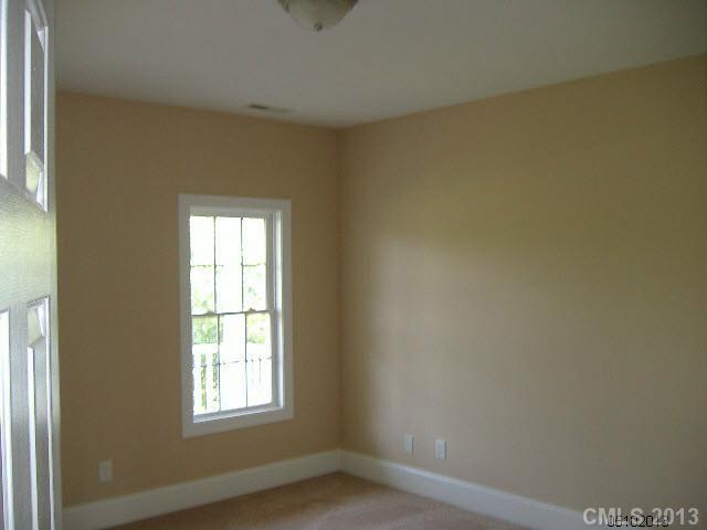 3827 Watson Church Road Monroe, NC 28110 - Photo 7 of 16 an empty room with windows