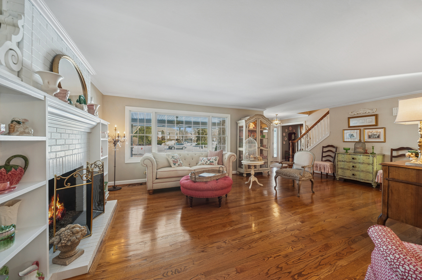 706 Cherry Court Itasca, IL 60143 - Photo 9 of 43 a living room with furniture and a fireplace