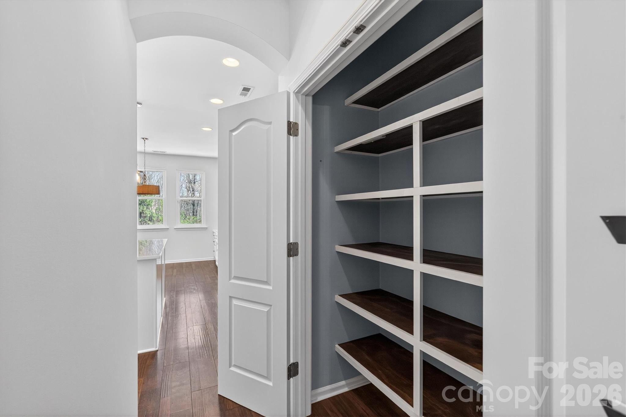 5527 Cactus Valley Road, Unit 183 Charlotte, NC 28277 - Photo 15 of 47 a view of walk in closet with empty racks