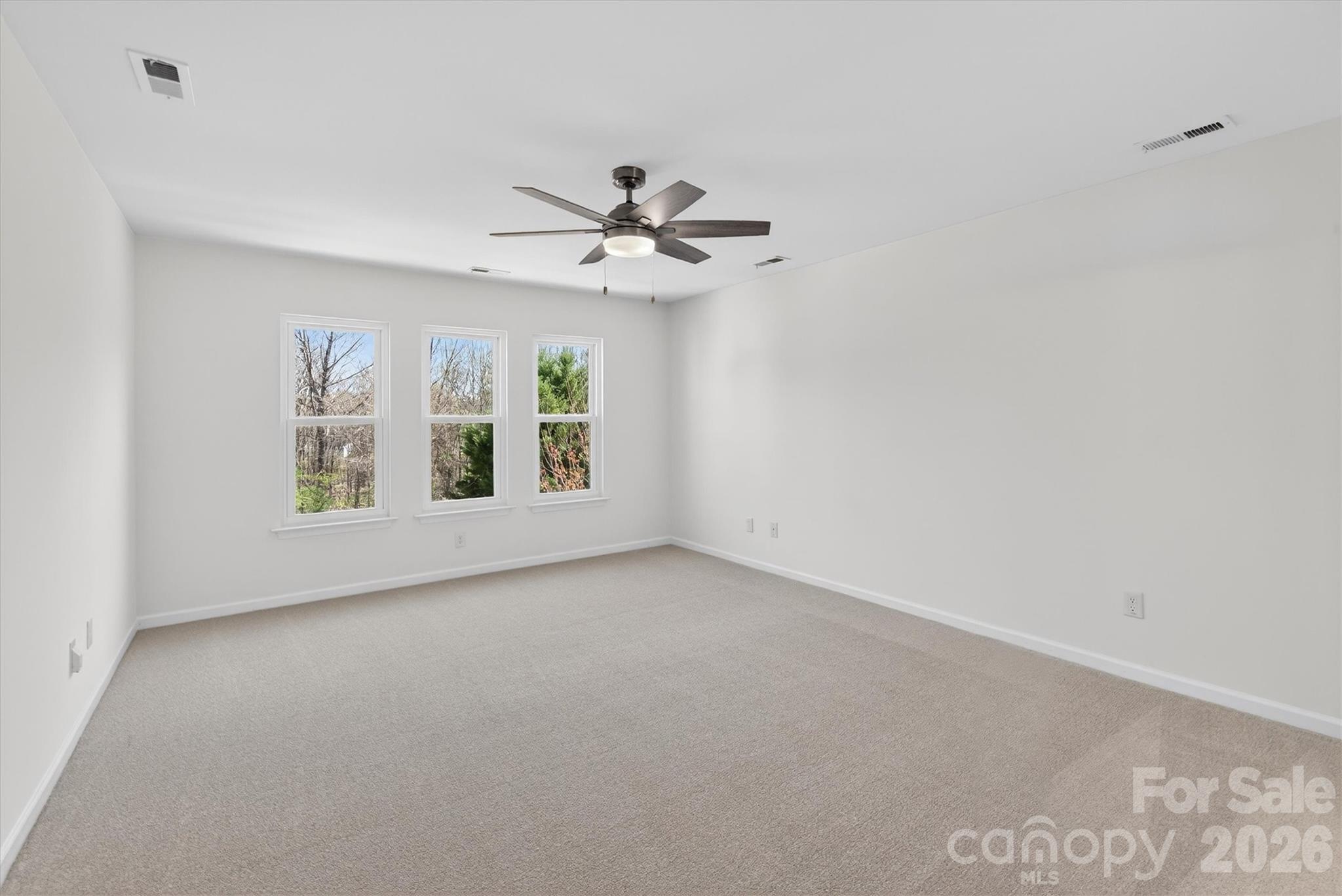 5527 Cactus Valley Road, Unit 183 Charlotte, NC 28277 - Photo 23 of 47 a view of an empty room with a window