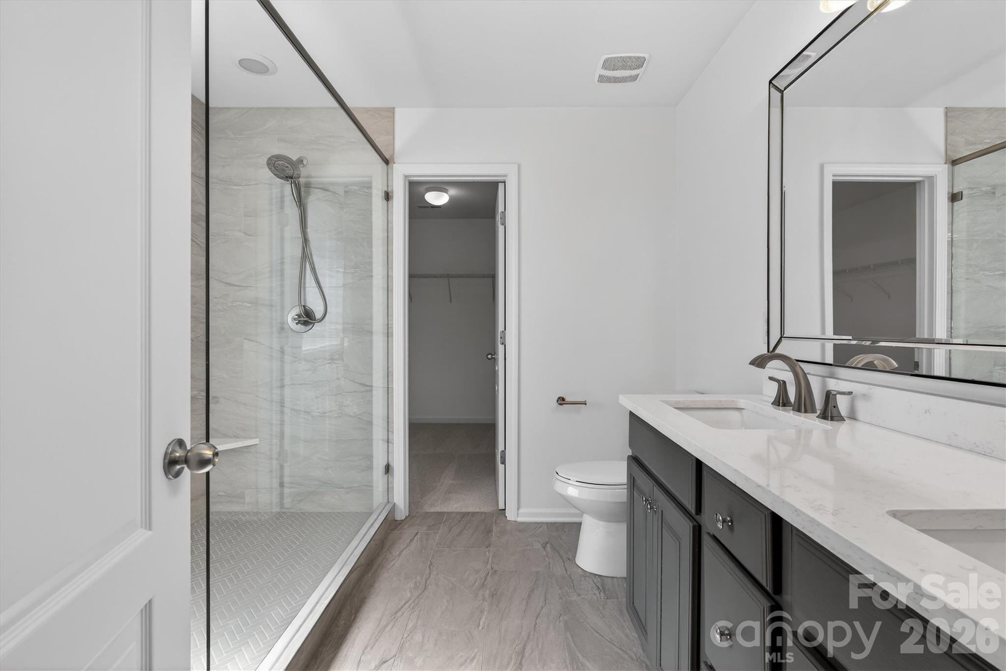 5527 Cactus Valley Road, Unit 183 Charlotte, NC 28277 - Photo 26 of 47 a bathroom with a sink a toilet and shower