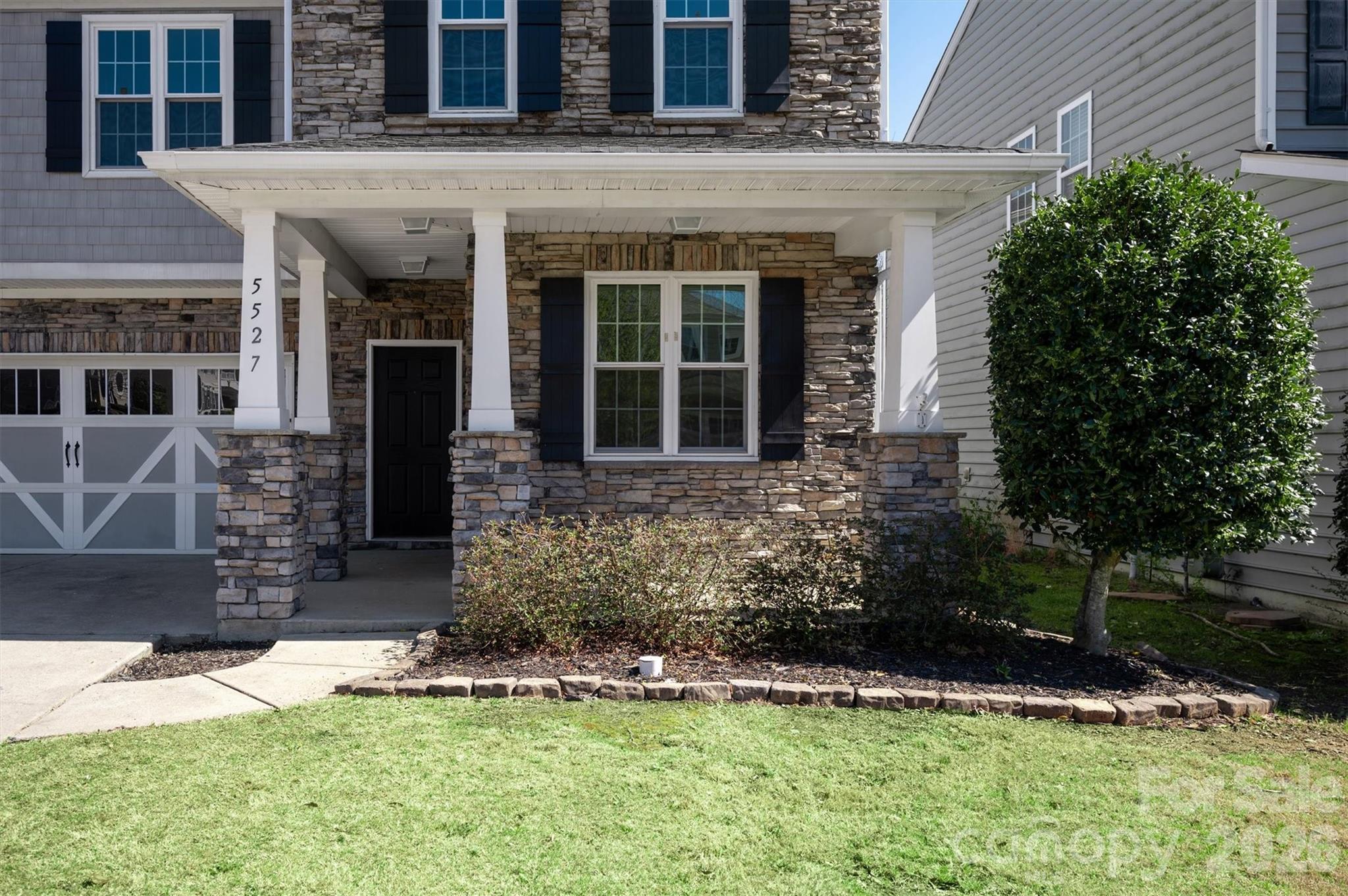 5527 Cactus Valley Road, Unit 183 Charlotte, NC 28277 - Photo 3 of 47 a front view of a house with garden