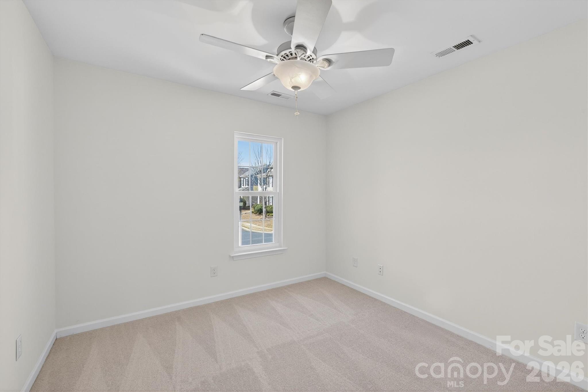 5527 Cactus Valley Road, Unit 183 Charlotte, NC 28277 - Photo 31 of 47 an empty room with windows and fan
