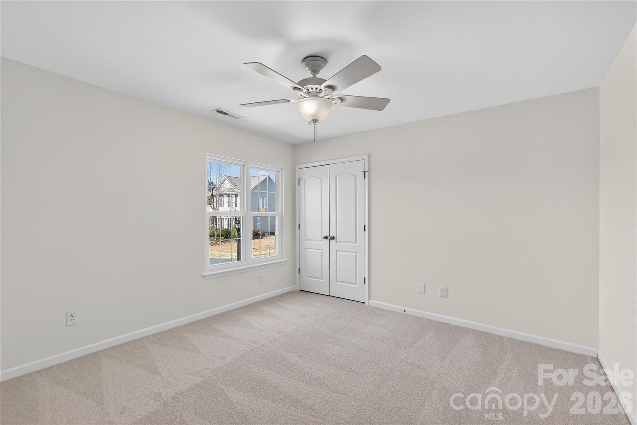 5527 Cactus Valley Road, Unit 183 Charlotte, NC 28277 - Photo 35 of 47 a view of an empty room with a window
