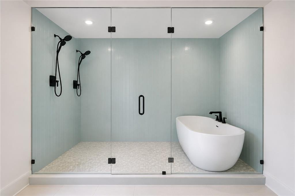 125 Old Alabama Road Southeast Emerson, GA 30137 - Photo 23 of 37 a bathroom with a bathtub and shower