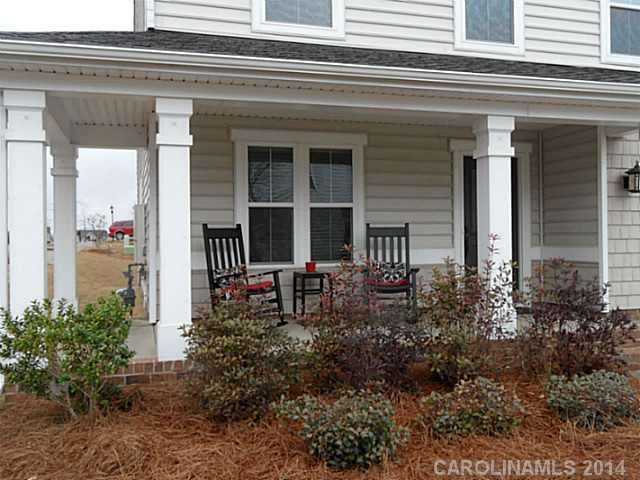 1018 Oakmere Road Waxhaw, NC 28173 - Photo 2 of 16 a view of house with outdoor seating space