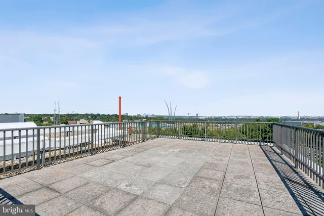 a view of a terrace with city view