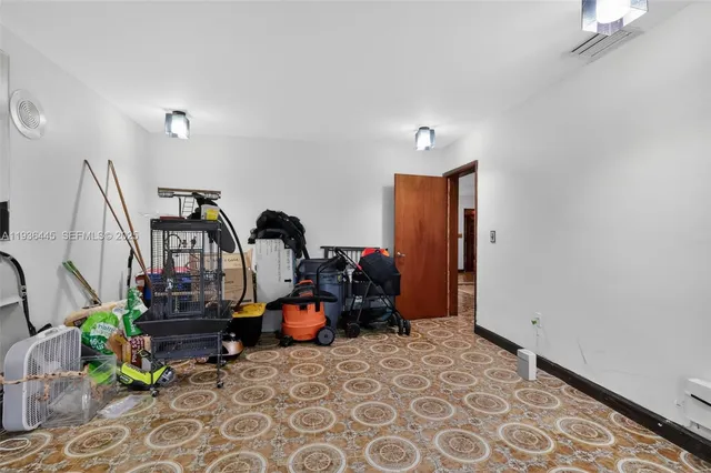 a bathroom with a toilet and a sink