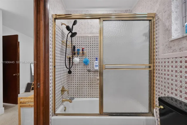 a close view of a sink and a washer and dryer