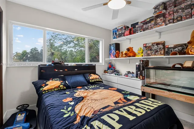 a room with gym equipment and a window