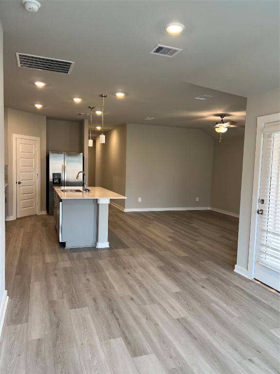 14330 Azalea Tree Drive Magnolia, TX 77354 - Photo 14 of 35 a view of a kitchen with a sink and a refrigerator