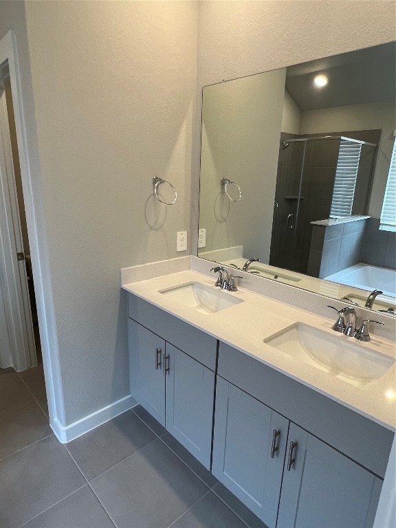 14330 Azalea Tree Drive Magnolia, TX 77354 - Photo 23 of 35 a bathroom with a sink and a mirror