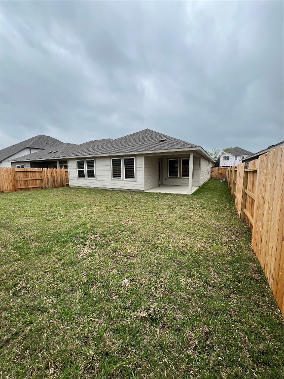 14330 Azalea Tree Drive Magnolia, TX 77354 - Photo 26 of 35 a view of a house with a yard
