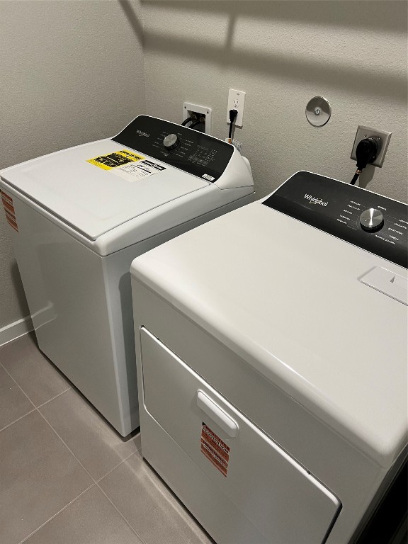 14330 Azalea Tree Drive Magnolia, TX 77354 - Photo 35 of 35 a utility room with dryer and washer